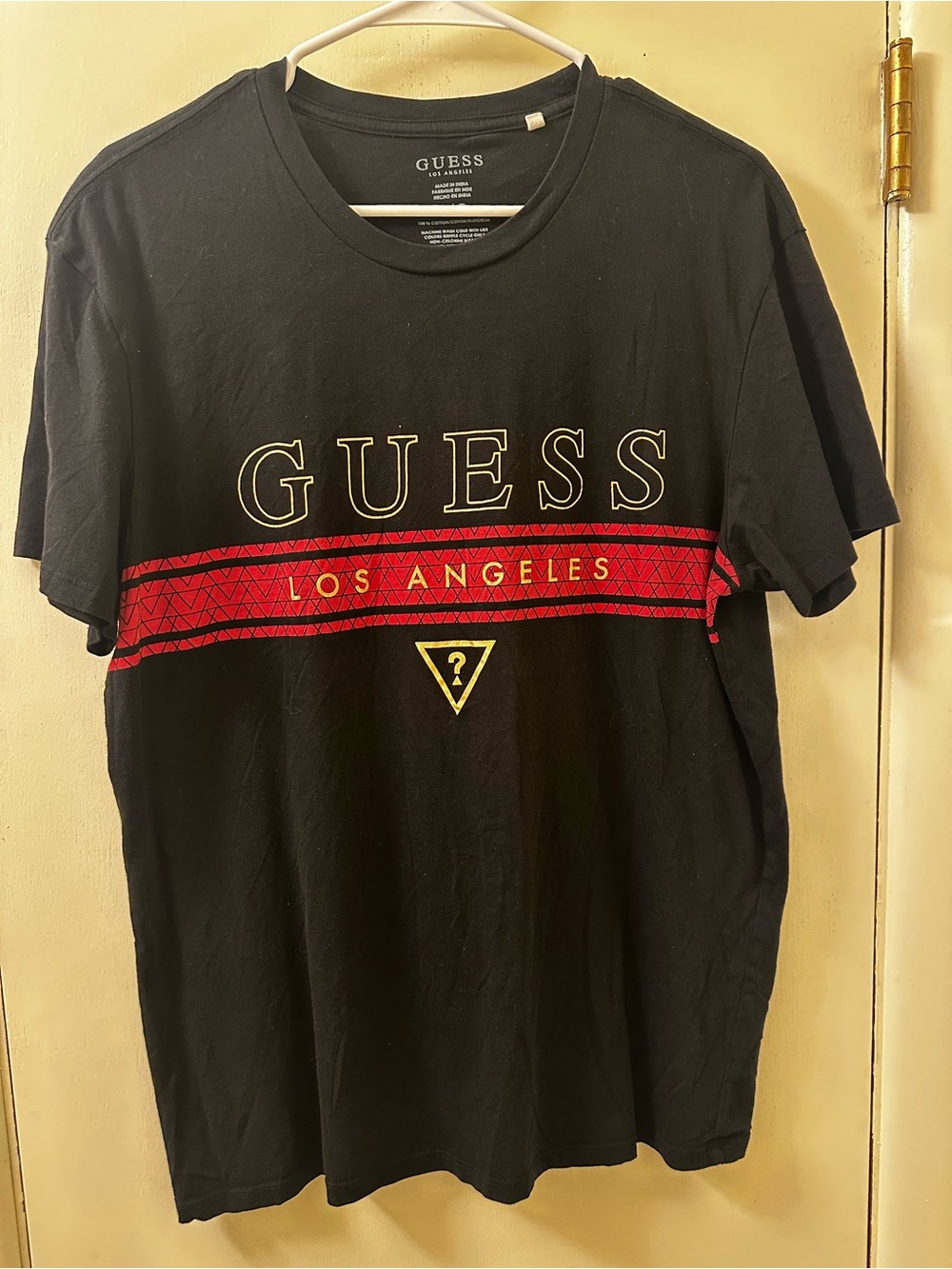 Guess Black Short Sleeve Tee with Red Stripe and Gold Logo